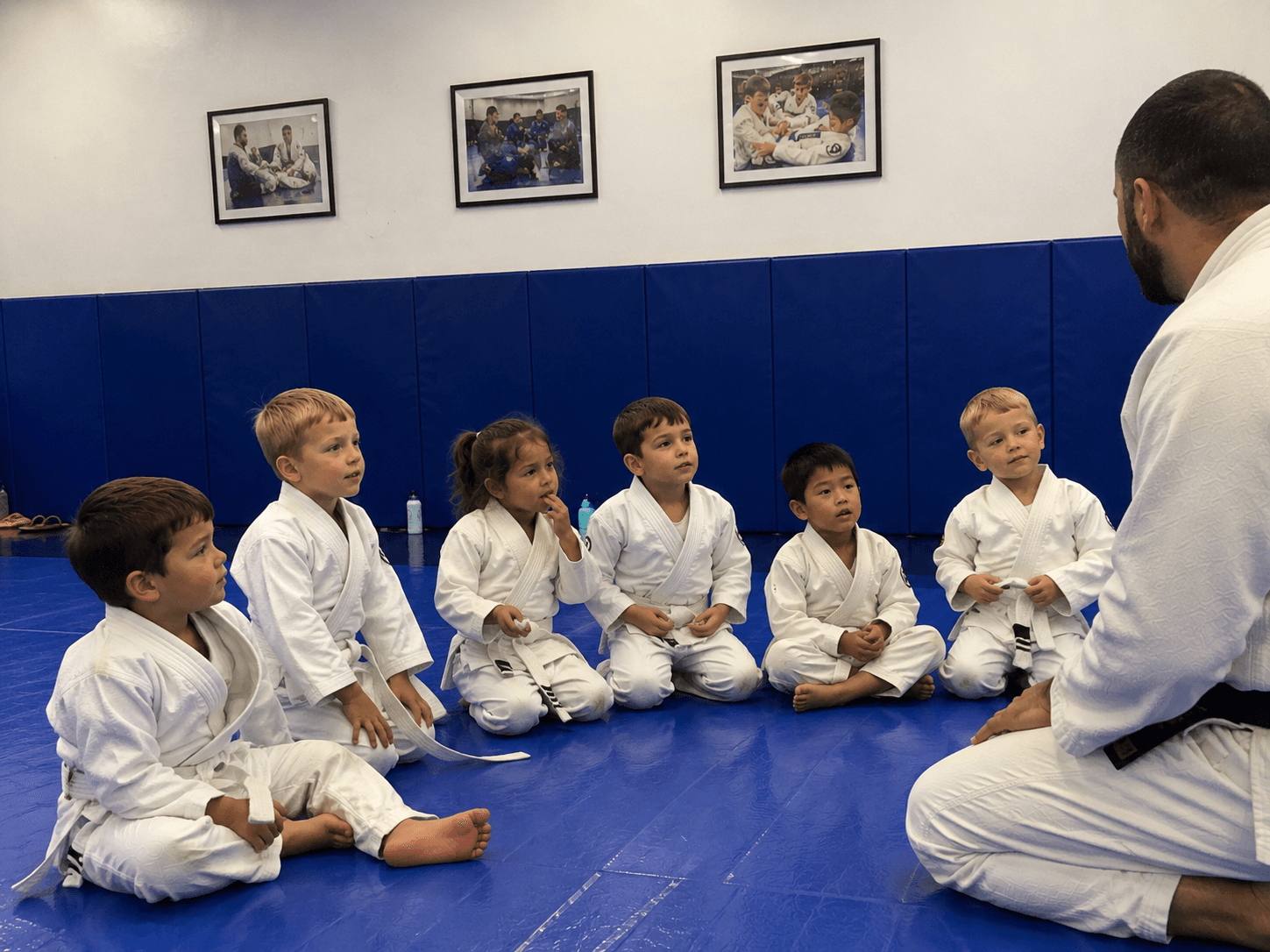 Young students training in boxing gloves during a Pre-K Brazilian Jiu-Jitsu class at Master Pete's BJJ Academy