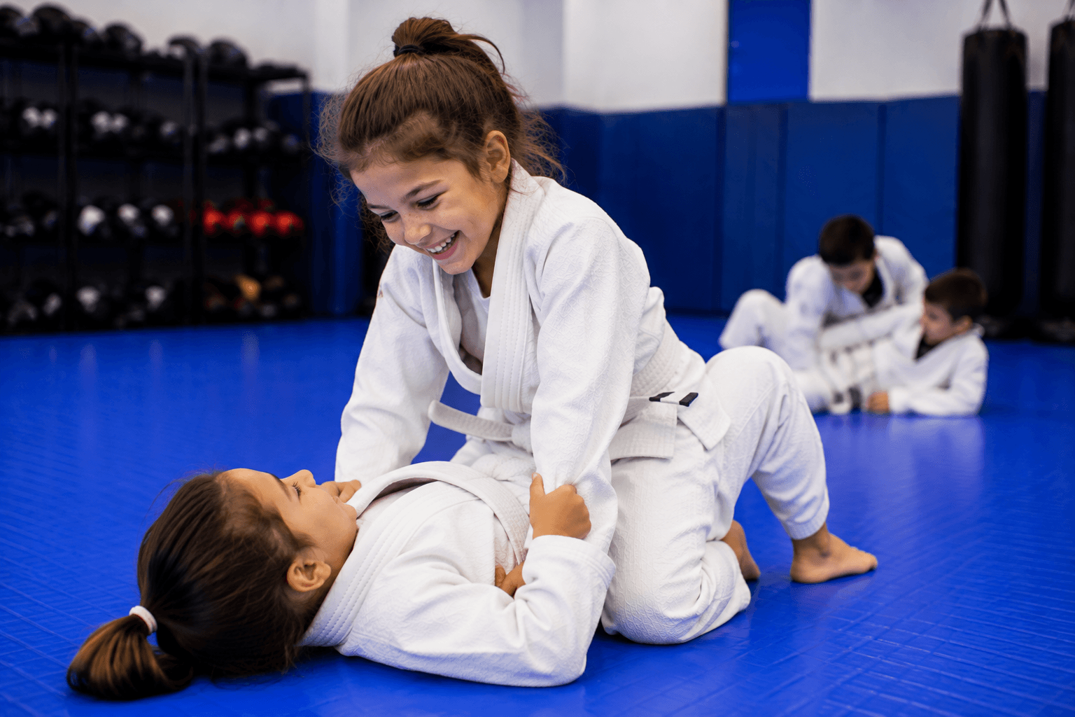 Smiling boy in a kids martial arts class at Master Pete's BJJ Academy