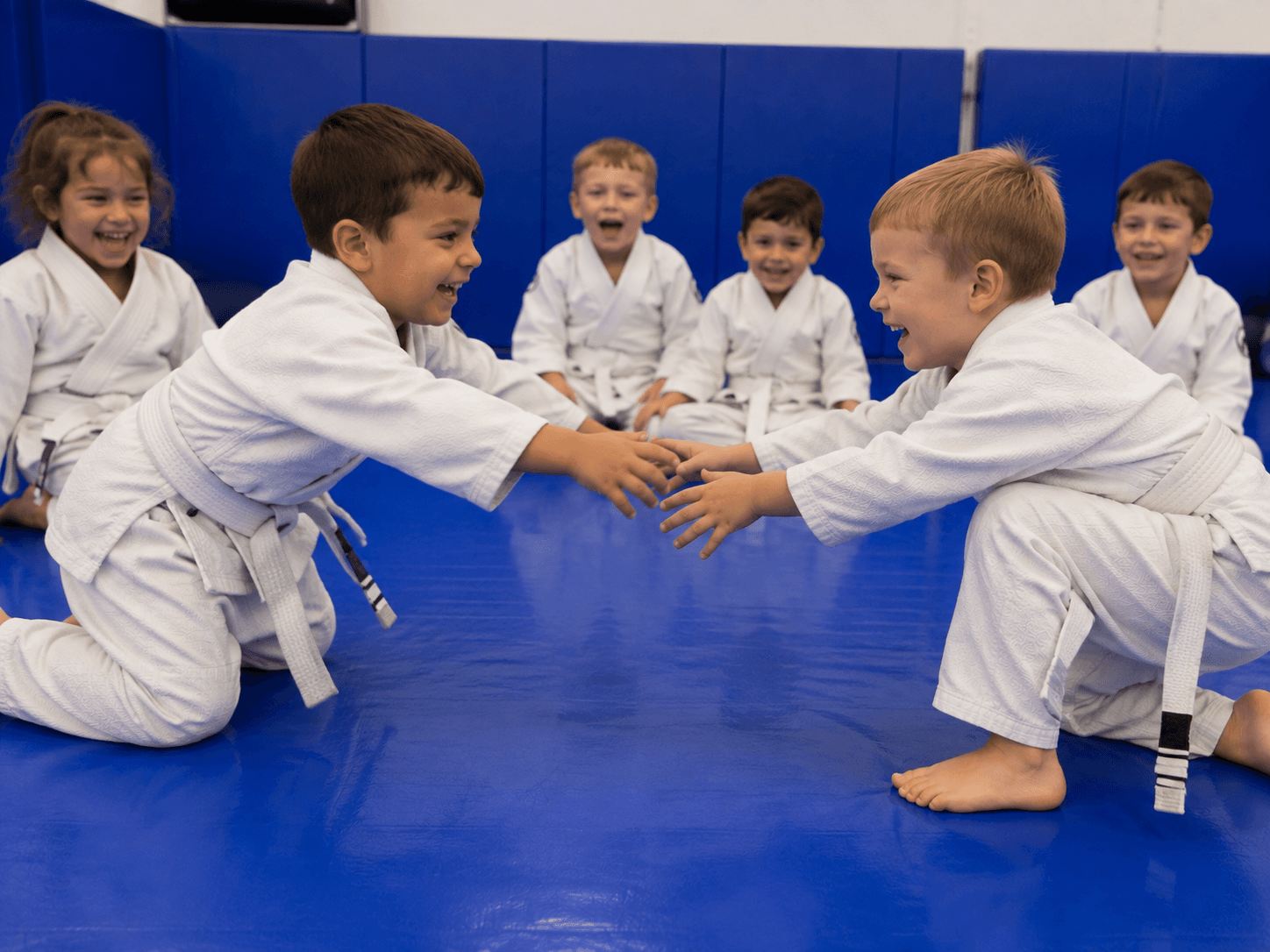 Coach working one-on-one with a student in class