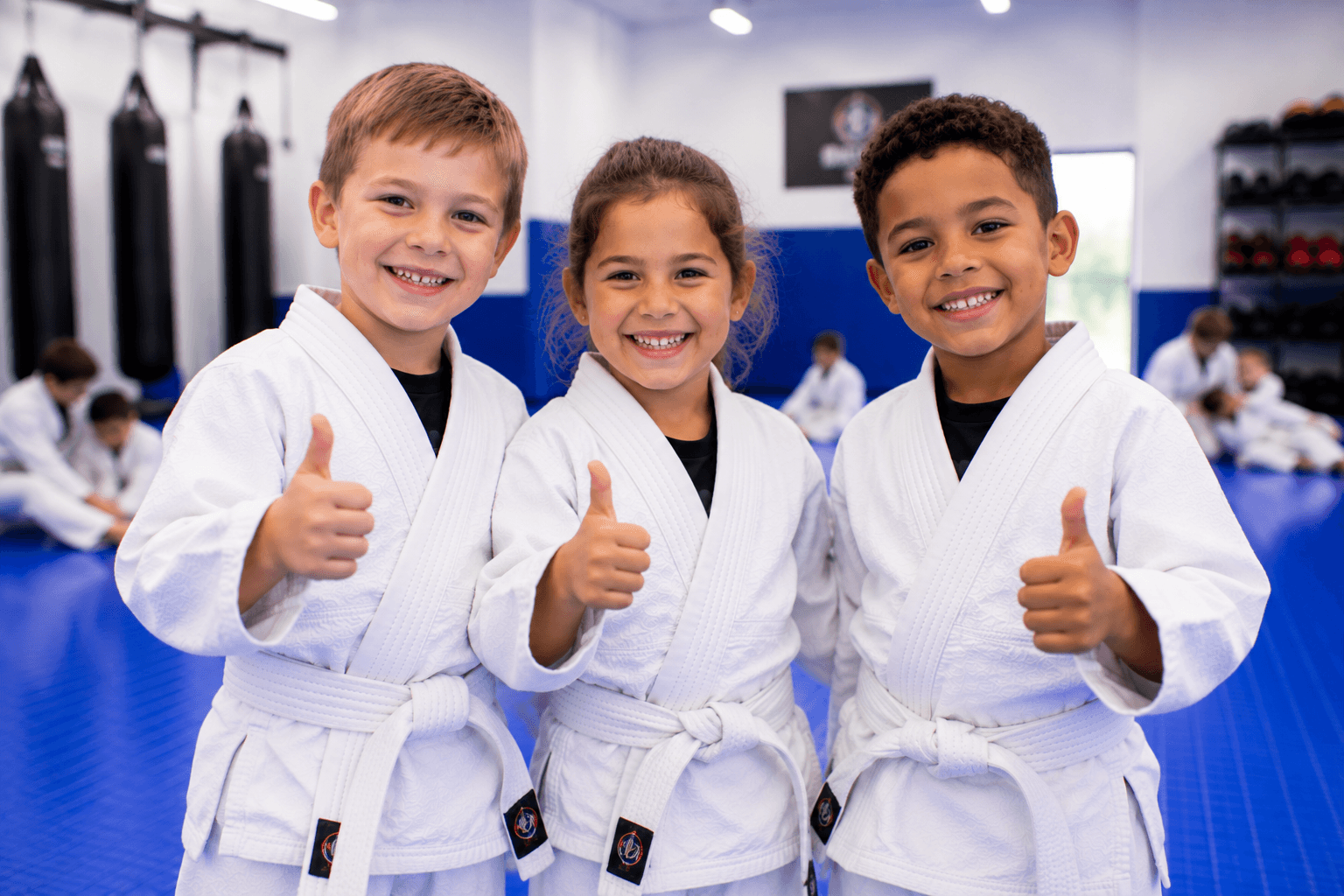 Adult member smiling during a kickboxing class at Master Pete's BJJ Academy
